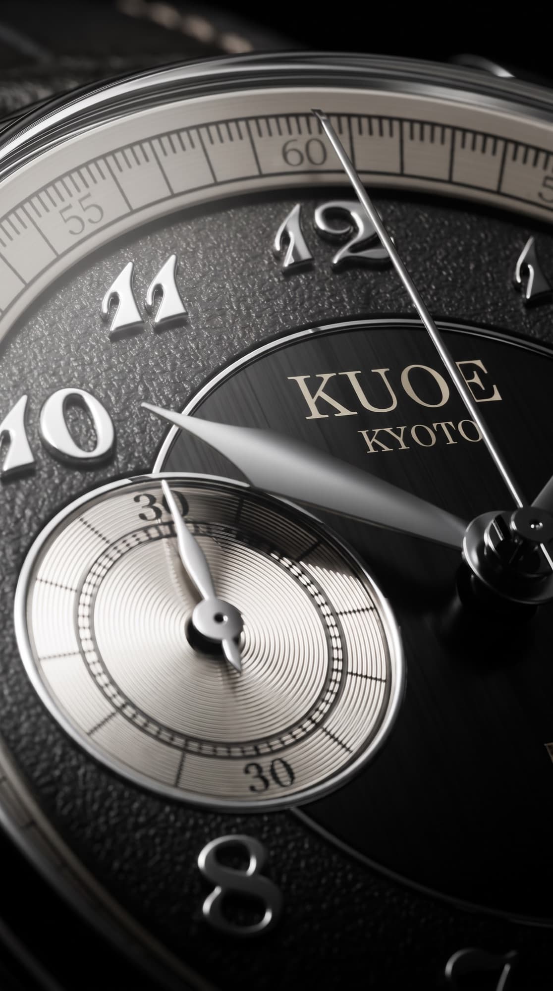 Dial detail showing the KUOE Kyoto signature and guilloché sub-register